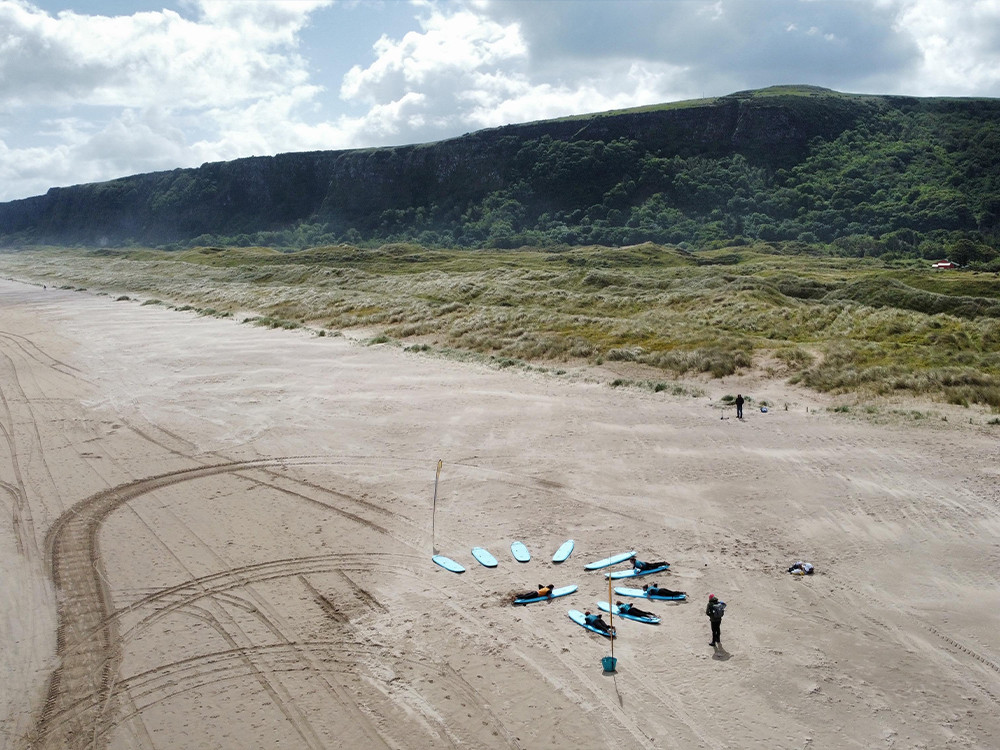 Surfen bij Benone Beach